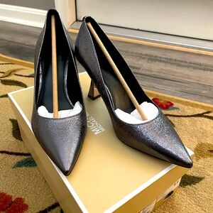 Metallic gray Michael Kors, size 8.5, 3.5in heel. Worn once for a wedding.